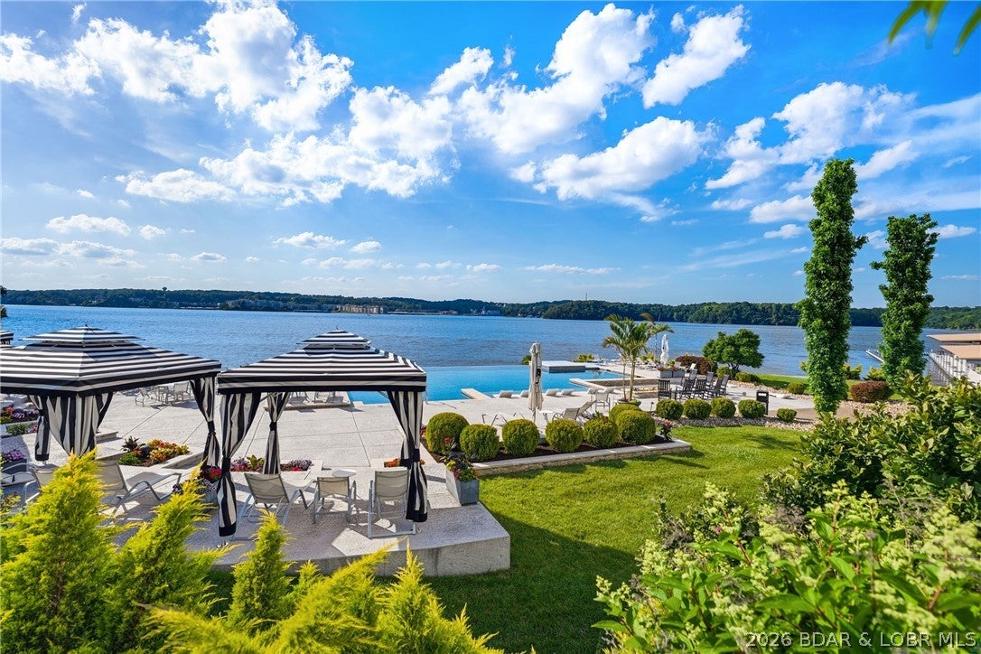 Experience the definition of luxury at the Lake of the Ozarks! Located at the coveted 12 MM in Sunrise Beach, this beautifully appointed 4-bedroom, 4.5-bathroom condo at Cypress at the Lake offers 2,013 sq. ft. of warm, inviting living space and comes fully furnished—ready for you to start enjoying lake life from day one. Your private 16x44 boat slip on Dock C features an electrical upgrade completed in 2025, giving you the perfect launch point for everything the lake has to offer.
Cypress at the Lake is a gated, rental-free community, offering a peaceful and upscale atmosphere without the worry of short-term rentals. Resort-style amenities include a heated community pool, fire pit, gas and charcoal grills, dog park, parking garages, whole-building generators, two elevators, on-site maintenance, housekeeping, and professional management.
Whether you're looking for a luxurious full-time residence, a weekend retreat, or simply a place to enjoy the lake in style, this condo checks all the boxes. Come experience why Cypress at the Lake is truly luxury at the Lake of the Ozarks!