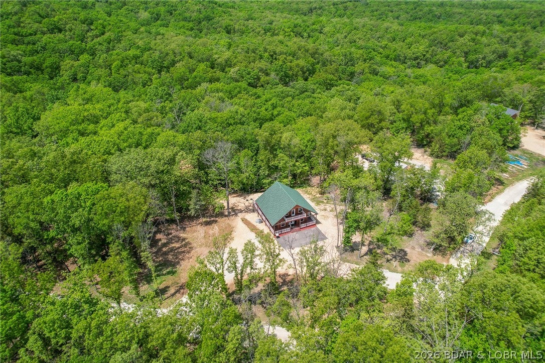 **Home sale includes $75,000 cash due to buyer at close for rental income or can be used towards garage allowances. The Estates of Kinderhook, “The Lake’s Premier Gated Resort Community“ offers private 5 acre home sites with amazing views. This 5 bedroom 3 bathroom furnished vacation home is located just minutes away from world famous Old Kinderhook’s Tom Weiskopf signature golf course. Enjoy golf, seasonal ice skating and fine dining just minutes away. Newly constructed clubhouse within gated development featuring spa, social areas, indoor/outdoor pools, jacuzzi, fire pits, pickleball courts, gym and sauna. Our design provides wrap around decks, and private entertaining areas. Upgraded appliances and a Jacuzzi hot tub. Schedule your property tour today! New two car detached garage to be added to existing property from cash or credits due to buyer at close upon buyer request.
