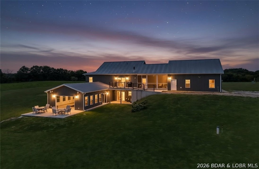 One of a Kind Property-Custom Built 4 bed, 4 bath, 2-level home sits on 10 acres. Features a gentle tree lined driveway & pasture- perfect for Hobby Farm. Open Floorplan, Kitchen w/solid oak custom cabinetry, huge island -features a one-of-a-kind built-in dining table that pulls out, granite countertops, farmhouse sink, solid walnut shelving, black stainless appliances & custom oak floors, Great room w/vaulted ceiling, walnut log mantle beam, cobblestone brick hearth,wood burning fireplace, Primary suite w/solid oak floors, bathroom w/walk-in Onyx shower, oak linen cabinets & Oversized tub, 2nd bdrm on the main level, Mudroom/pantry w/Wall to wall custom cabinets, Attached 2 car garage - heat/cooled & an insulated & drywalled loft. Lower Level features a family room with/ full kitchen,  2 beds with ensuites & storm shelter/storage room that is enclosed in concrete & has a sink & ventilation.PLUS = Outdoor Areas; screened in porch, concrete decks & patios, front porch w/stamped and colored concrete. Attached pool house w/2 dressing rooms, salt water in-ground pool, glass garage door for indoor/outdoor living, Bluetooth speakers, independent HVAC. 20+/- min from LOZ & Jefferson City.