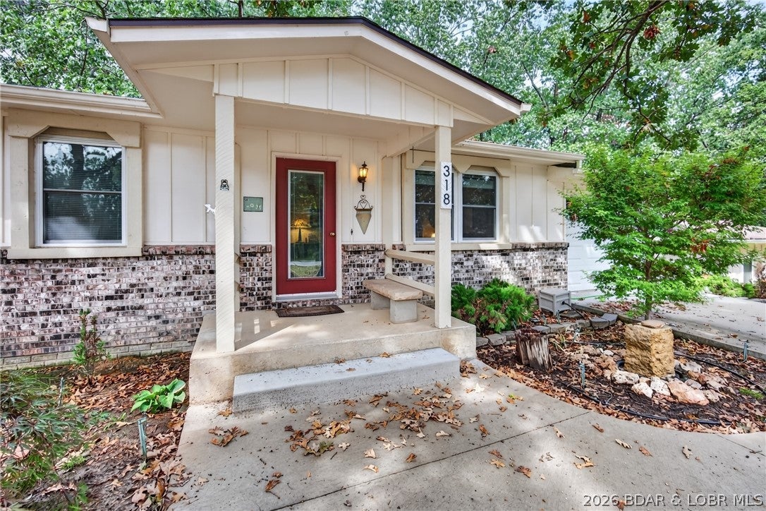 Looking for garage space? This one has 5… YES, FIVE garage spaces! Add 4 bedrooms, 2 baths, and 1.6 acres, and you have a property you won’t want to miss! With approximately 2,150 finished square feet, this inviting home offers space to settle in, spread out, and make it your own. Natural light fills the living room, while the kitchen offers abundant cabinetry, glass-front display cabinets, and an adjoining dining area that opens onto the spacious deck. Enjoy morning coffee beneath mature trees, host a backyard gathering, or unwind in the peaceful setting. Built-in deck seating, a shaded patio, and a fenced backyard area make outdoor living easy. The separate lower-level living area provides room for movie nights, hobbies, or entertaining, while workshop and storage space give your projects a place of their own. A covered front porch and generous concrete driveway complete the package. Space, charm, and FIVE garage spaces—come see why 318 Dunwurkin Road should be your next move. Schedule your showing today!