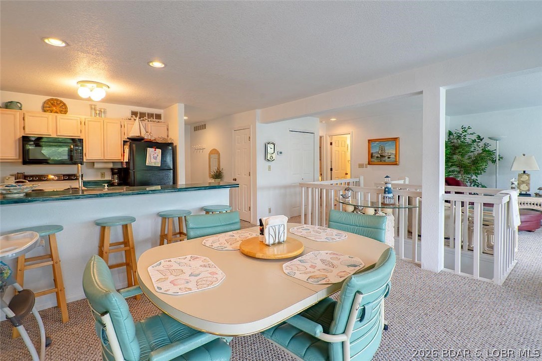 3 Bedroom, 3 Bath lakefront condo in Regatta Bay Condominiums at Lake Ozark, located at the 12-mile marker on Horseshoe Bend. This spacious 2-level condo features two private and a covered 10x30 boat slip. One of the best locations in the complex with easy walking access to the lakeside pool and community dock. The interior offers classic Lake of the Ozarks charm with a comfortable, relaxed feel, ready to enjoy immediately or update to your style. Mostly furnished and move-in ready. Regatta Bay offers resort-style amenities including a lakeside pool, clubhouse, tennis courts, pickleball courts, playground, and community docks. Short-term rentals are allowed, making this an excellent opportunity for a vacation home, Airbnb investment property, or nightly rental. Conveniently located near popular Lake of the Ozarks destinations including Shady Gators, Lazy Gators, Camden on the Lake, JB Hook’s, Baxter’s Lakeside Grille, waterfront restaurants, entertainment, golf courses, and shopping by land or water. Ideal for buyers searching for a lakefront condo with boat slip, waterfront vacation property, nightly rental investment, or turnkey Lake of the Ozarks getaway on Horseshoe Bend