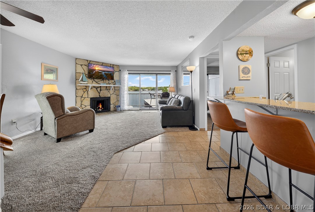 Fresh, clean & updated 2-level condo in the highly desirable center of town! This unique double-unit features lake views from 2 large covered decks & unique access to the annual Lake of the Ozarks Shootout. Recently refreshed top to bottom with: paint, flooring, fixtures & furnishings- this condo is completely move in and nightly rental ready for the season! Layout is ideal hosting guests & the LOCATION is everything! Minutes from area’s top attractions- Dog Days, State Park & new Oasis Entertainment Complex, this condo sits in a growing & in demand area of Lake. With so much development within a 5-minute radius, it makes this a great investment. Sold fully furnished & turnkey with updated appliances, HVAC, water filtration system & full-size washer/dryer. Dual entry from both the lower (#111) & upper (#121) levels adds flexibility. Enjoy an owner-managed HOA, Social Club area with commercial ice machine & access to Hawks Nest Resort pool. The community is known for its fun, welcoming vibe, including holiday weekend dock parties with live music and cookouts. Comes with 10x24 boat slip & great fishing right in the cove. Easy lake living, strong rental potential, unbeatable location!