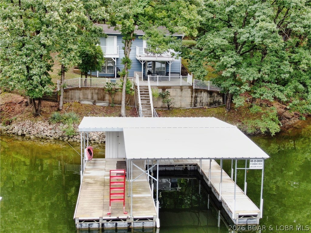 Beautifully remodeled, turn-key lakefront home offering the perfect combination of Lake of the Ozarks living and rental potential! This 4-bedroom, 2-bath home features a completely updated interior with modern finishes, an inviting open layout, and plenty of space for family, friends, or vacation guests. Thoughtfully remodeled and being offered turn-key, this property is ready to enjoy as a full-time residence, second home, or investment property.

Outside, enjoy the lake from the spacious deck and patio, providing the perfect setting to relax, entertain, and take in beautiful lake views. The property is well-suited for enjoying all the Lake of the Ozarks lifestyle has to offer.

Conveniently located just minutes from the Bagnell Dam Strip, Osage Beach Parkway, restaurants, shopping, and entertainment. The property's turn-key condition, remodeled interior, desirable location, and established vacation-rental potential make it an excellent opportunity for buyers looking for a personal lake retreat or investment property. Come see everything this Lake of the Ozarks property has to offer!