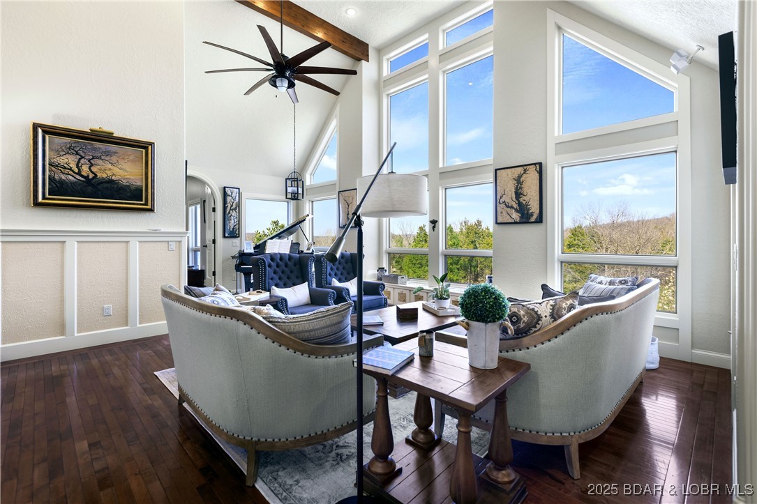 Discover the epitome of luxury & comfort in Old Kinderhook Golf Resort at the beautiful Lake of the Ozarks with this stunning 6-bedroom, 3.5-bathroom residence, where every detail is precisely crafted for an unparalleled living experience. Home sits on 3 large lots right on the Golf Course. From the moment you arrive, the heated, flat driveway welcomes you, setting the stage for the marvels within. Heart of the home is the kitchen, equipped with modern appliances, three food warming drawers, a cozy breakfast nook, & a dining room, perfect for both casual and formal gatherings. Master suite is a sanctuary of relaxation, featuring a sitting room with a see-through fireplace that transitions to the primary bath, highlighted by a jetted tub for ultimate relaxation. There are many entertainment options with a media room, game room, & a uniquely concealed wine cellar behind a secret wall entrance. Additionally, a panic/storm room offers peace of mind. The outdoor space is equally impressive, with extensive decking both covered and uncovered, a gazebo, climate controlled green house, and a waterfall with ponds, all set against the backdrop of the prestigious Old Kinderhook golf course.