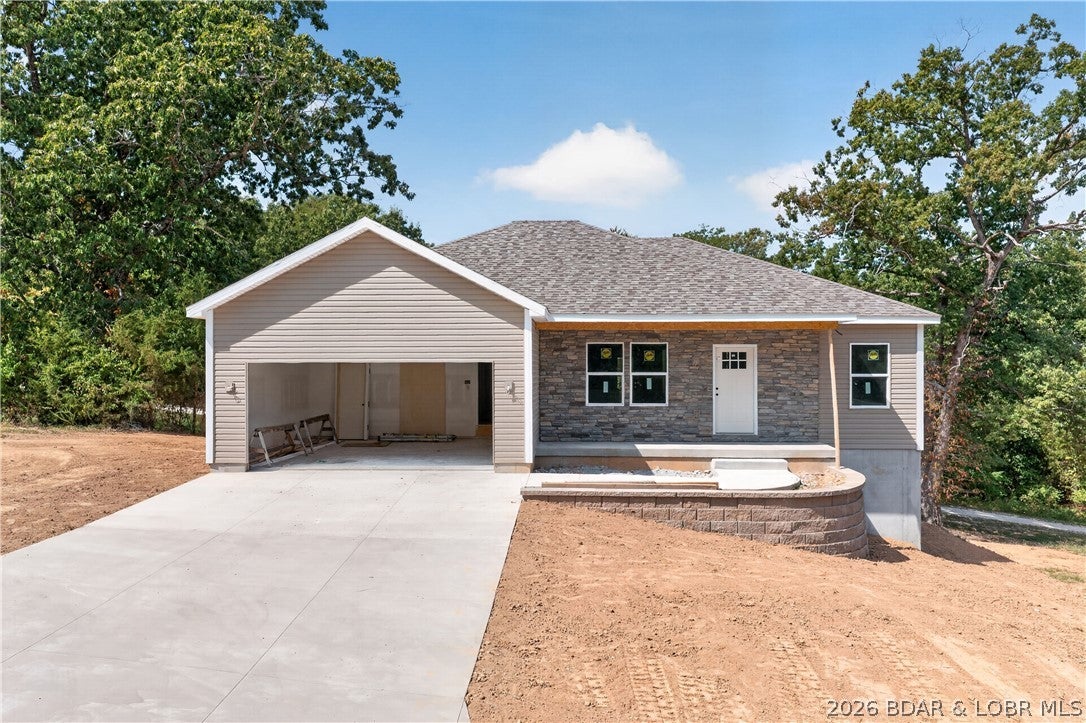 BRAND NEW 2026 Home Under Construction! Located in a 55+ community, this new construction home offers main level living with 3 bedrooms, 2 baths, laundry and an open kitchen, dining & living area—all on one level. Upgraded cabinetry with soft close drawers and doors, a large kitchen island and quartz countertops, custom trim and carpentry details, a tray ceiling in the primary suite and thoughtfully selected finishes set this home apart from your typical new build! The primary suite features a private bath & walk-in closet with the other bedrooms on the opposite side of the home. Enjoy a covered deck overlooking the backyard plus a covered patio below. Need more space? The 1,400 sq ft unfinished basement offers incredible storage today and room to finish however you choose down the road! Man cave, craft room, game room, workshop, more bedrooms...this space is unlimited opportunity! A 2-car garage, low-maintenance vinyl exterior, and convenient location! Completion just around the corner!!!