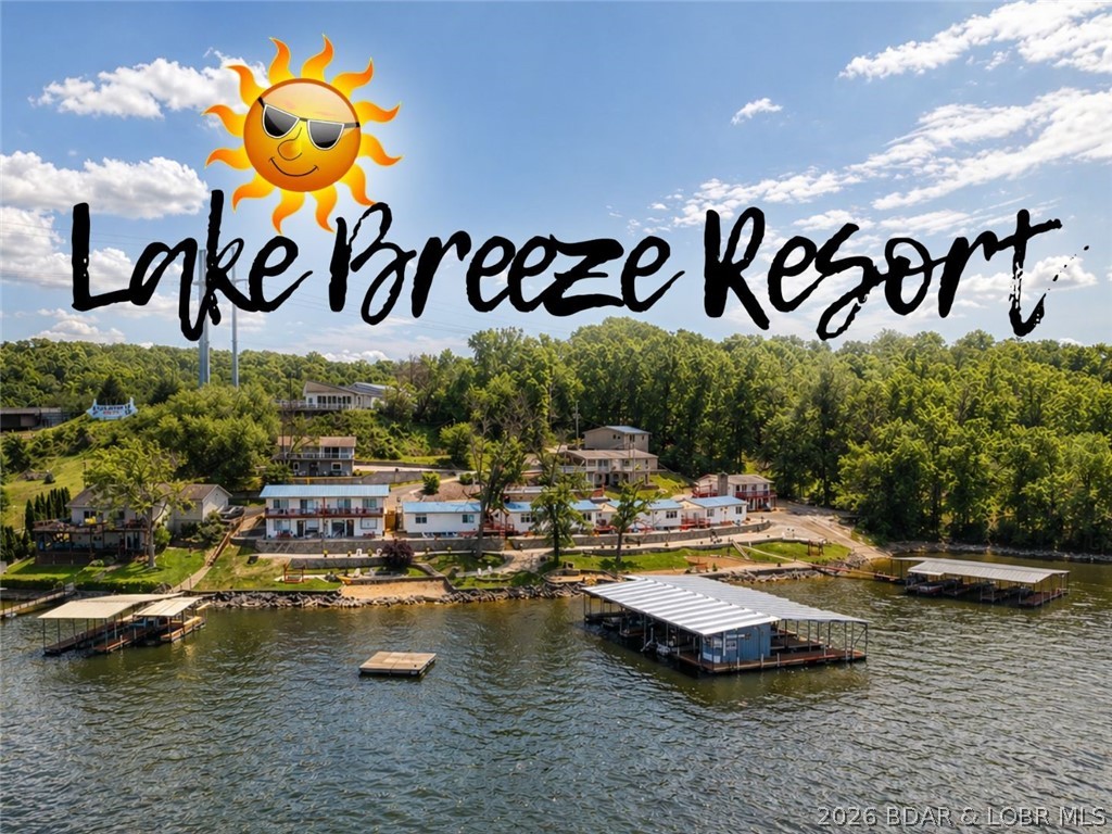 Lake Breeze Resort is back on the market at no fault of the sellers! This commercial opportunity presents a rare opportunity to own a thriving resort in Camdenton on 3MM of the Big Niangua. This charming property is the perfect combination of rustic charm with modern comforts & sits on 1.5 Acres with 495ft of Lakefront. There are 18 total units on the property, including 11 waterfront units, 6 lakeview units & a 3 Bed owners residence that sits above the Clubhouse/Office/Gift Shop & walks directly out to the resort's community pool. This resort features tons of family friendly amenities,s including fire pits, a beach, playground, boat ramp, plenty of boat trailer parking & 2 commercial docks with 17 rental slips, fishing area, swim dock & is being sold completely turnkey! Plus this property offers the opportunity for multiple revenue streams with 2 pontoons, 2 fishing boats & a variety of water toys that can be rented out to guests. Not only is this property income-producing, it is perfectly located by land & water by the Niangua Bridge & across from one of the lakes' most popular waterfront spots, The Cave! Don't miss out on this investment opportunity before summer 2026!