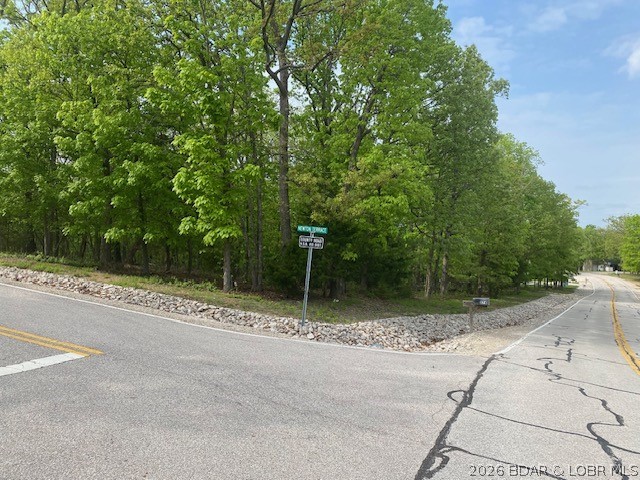 Corner the market with this Affordable, Buildable lot centrally located in the Village of Four Seasons...the lot is located at the corner of Cambridge Dr & Newton Terrace, just off of Bittersweet...providing a level topography to build your new home!  Four Seasons offers property owners their exclusive amenities- community center w/ activities & classes, fitness facility, indoor/outdoor pools, dog park, hiking & biking trails, pickleball, tennis & basketball courts, playgrounds, camping grounds, boat ramp & trailer parking, & access to multiple nearby golf courses for a true sense of community (please visit fourseasonspoa.com for a full view of this communities amenities & events). Additionally, the culture of the area embraces an array of entertainment venues, shopping experiences and dining pleasures providing family & friends all the best the Lake of the Ozarks has to offer.