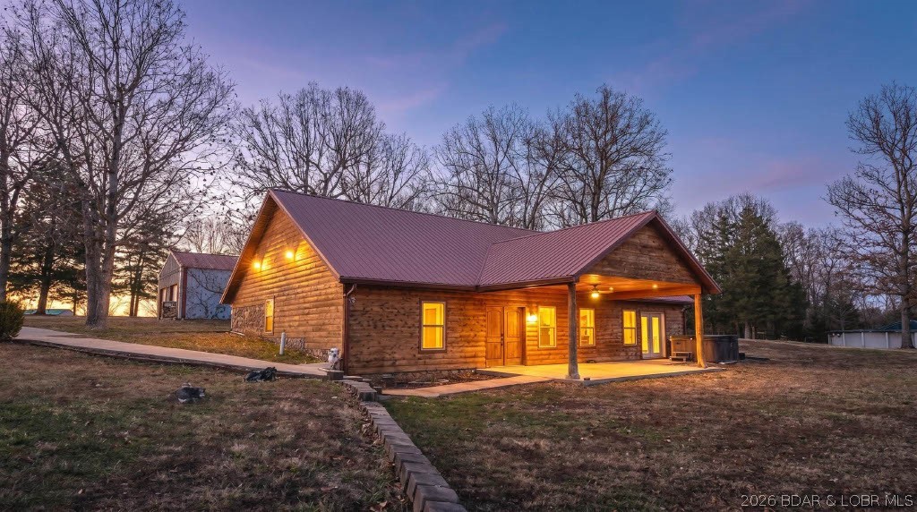 Located in Pulaski County, MO this charming 3-bedroom, 2-bathroom home offering over 2,200 sq ft of comfortable living space. Wrapped in wood siding for a classic log-cabin feel, this property sits on approximately 8 m/l acres of mostly wooded land—perfect for anyone who loves privacy, nature, and room to roam. A pond adds to the beauty of the setting, while an above-ground pool offers a great spot to cool off during warm Missouri summers. The property also features a 2-bay detached shop, ideal for storage, parking, or your favorite hobbies. Located in the Laquey School District, this home provides a blend of country living and convenience. Approximately 20 minutes from Ft. Leonard Wood and joins National Forest for great deer and turkey hunting.