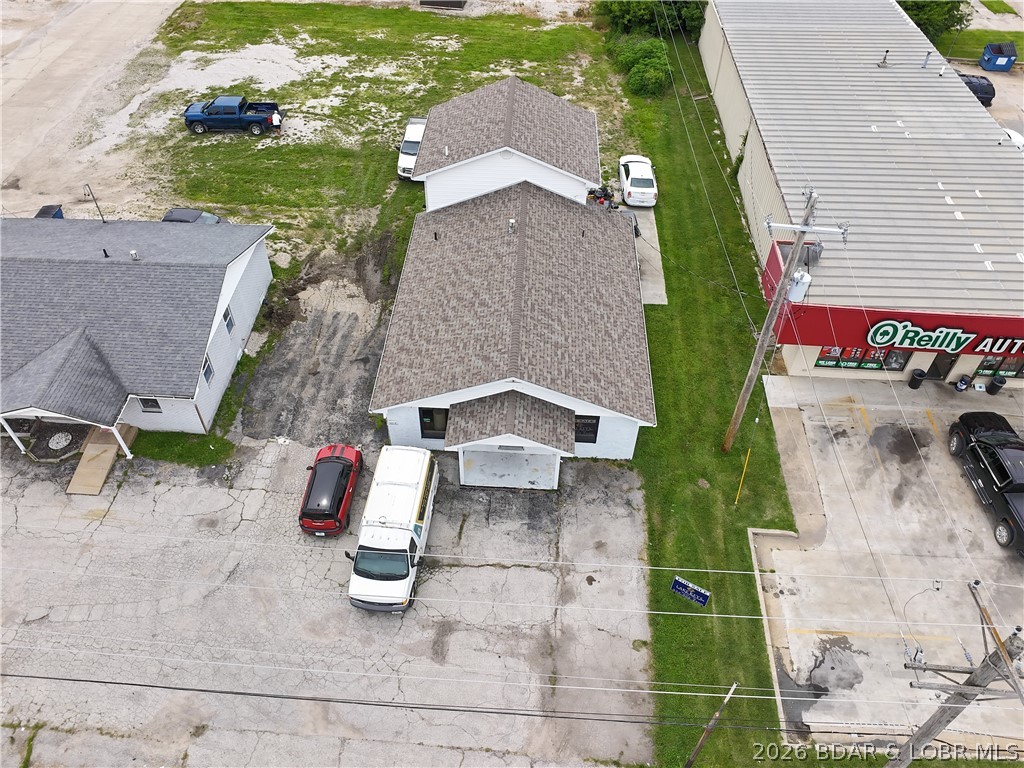 Excellent commercial opportunity on high-traffic Business Hwy. 54 in Eldon! This 1,740 sq. ft. building offers outstanding visibility and includes an additional lot for future expansion, additional parking, or new construction. The flexible floor plan features removable interior walls, 2 restrooms, a kitchenette, and a well-maintained interior ready for a variety of business uses including office, retail, salon, or professional services. Conveniently located between O'Reilly Auto Parts and Cree-Mee Drive-In, directly across from Eldon City Park, with excellent exposure and easy access.