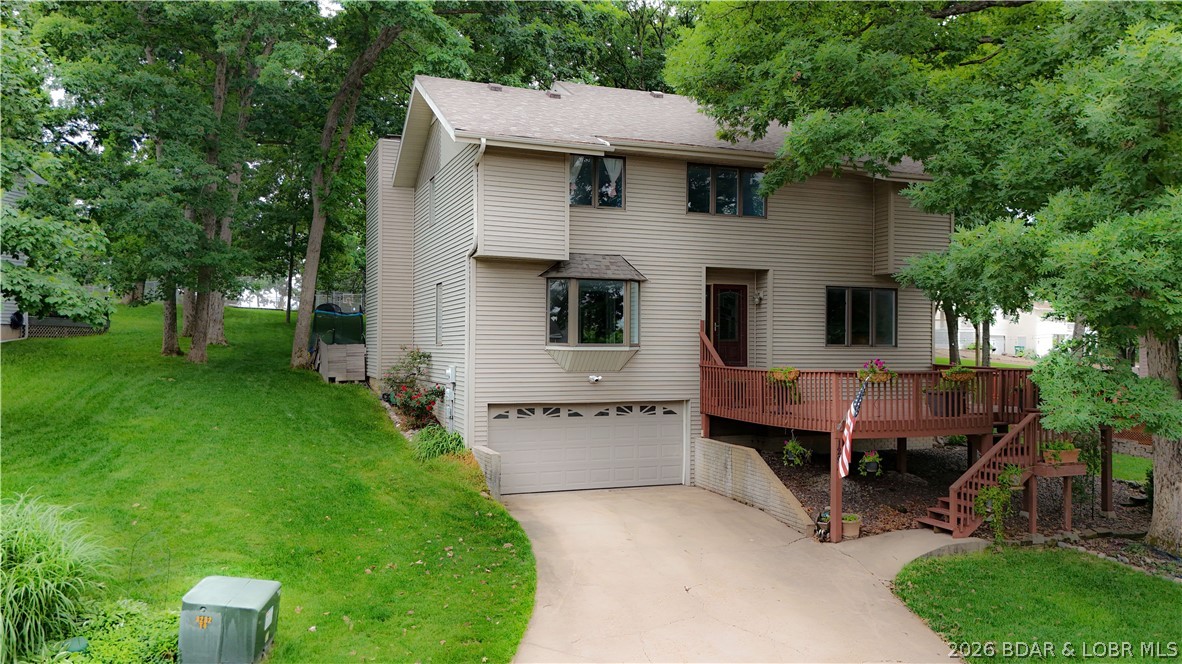 Rarely does a home check this many boxes at this price. Located in one of the Lake’s most sought-after neighborhoods, this spacious 4 bed/4 bath home offers over 3,300 s.f. yet feels even larger thanks to multiple living areas, generous room sizes, and a layout designed for gathering. The HUGE screened porch and seasonal lakeview create the perfect backdrop for relaxing or entertaining, while the oversized yard backs directly to the community pool, lighted tennis and pickleball courts, basketball court, playground, and firepit area—truly an ideal setup for families. Included is a boat slip w/hoist in the community dock, making lake days easy and convenient. The recently finished lower level adds even more flexible living space plus another full bath and oversized laundry area, perfect for a second family room, game room, bunk area, or man cave. Deep 2-car garage offers excellent storage for lake toys and golf carts. Buyers also love this neighborhood for its low HOA dues and golf-cart-friendly lifestyle with easy access to Dierbergs Markets, Ace Hardware, restaurants, and shopping. Currently priced UNDER recent appraised value for quick sale—opportunities like this rarely last.
