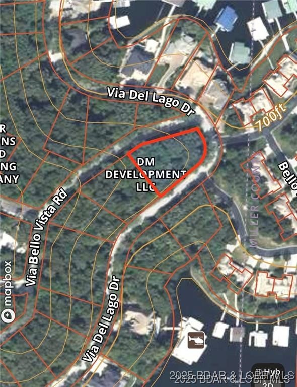 Discover the perfect canvas for your dream home on this 0.635-acre corner lot in the highly sought-after Porta Cima community. Ideally situated at the intersection of Via Del Lago Drive and Via Bello Vista Road, this property boasts Lake of the Ozarks views and a gentle slope that’s perfect for any style of home.
Enjoy exclusive lake access and full Four Seasons amenities, including golf, pools, tennis, pickleball, marina, clubhouse, and a  fitness center and much more. Electric, water, and sewer are available, making building your lakefront retreat seamless.
Whether you’re planning a full-time residence or a luxury lake getaway, this lot offers the perfect combination of prime location, serene views, and upscale community living. Don’t miss this rare opportunity to secure your spot in one of the Lake of the Ozarks’ most prestigious neighborhoods.