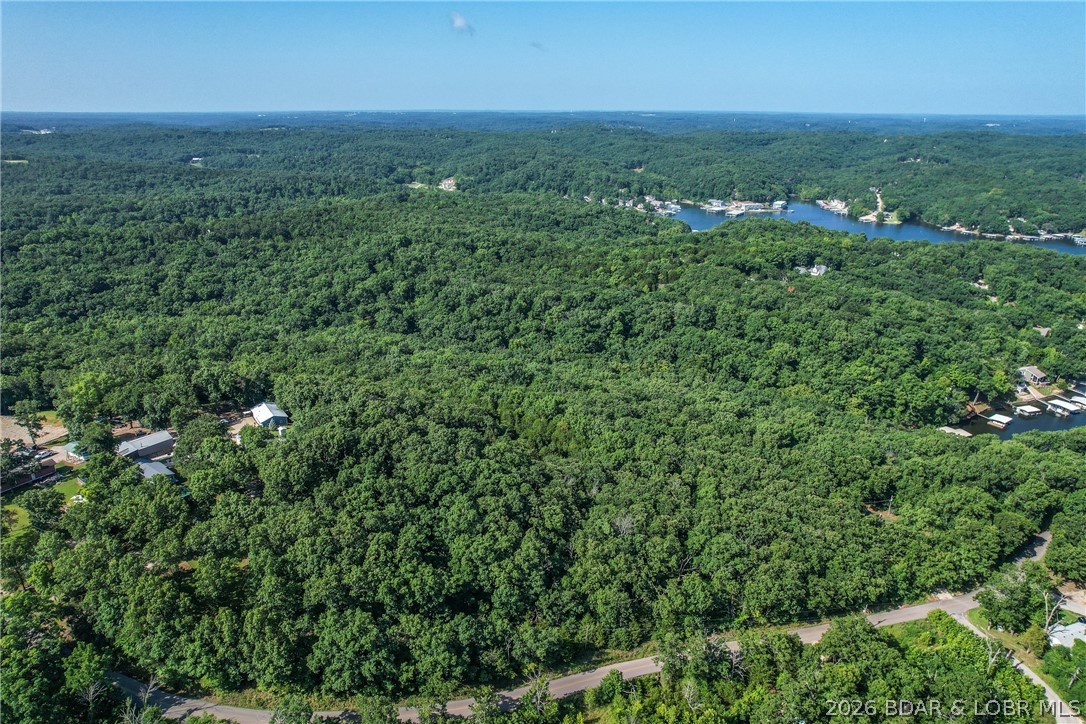 14 acres off Runabout Rd at the Lake of the Ozarks, just off Hwy 54. Space to build, space to breathe, and make it your own. Lake frontage you can enjoy, with access to the water. A solid piece of ground with potential for a private retreat, recreational enjoyment, or an investment for down the road, whether you're ready to start fresh now or hold for later. Nearby dining, shopping, entertainment, and medical facilities round out all that Lake of the Ozarks living has to offer.