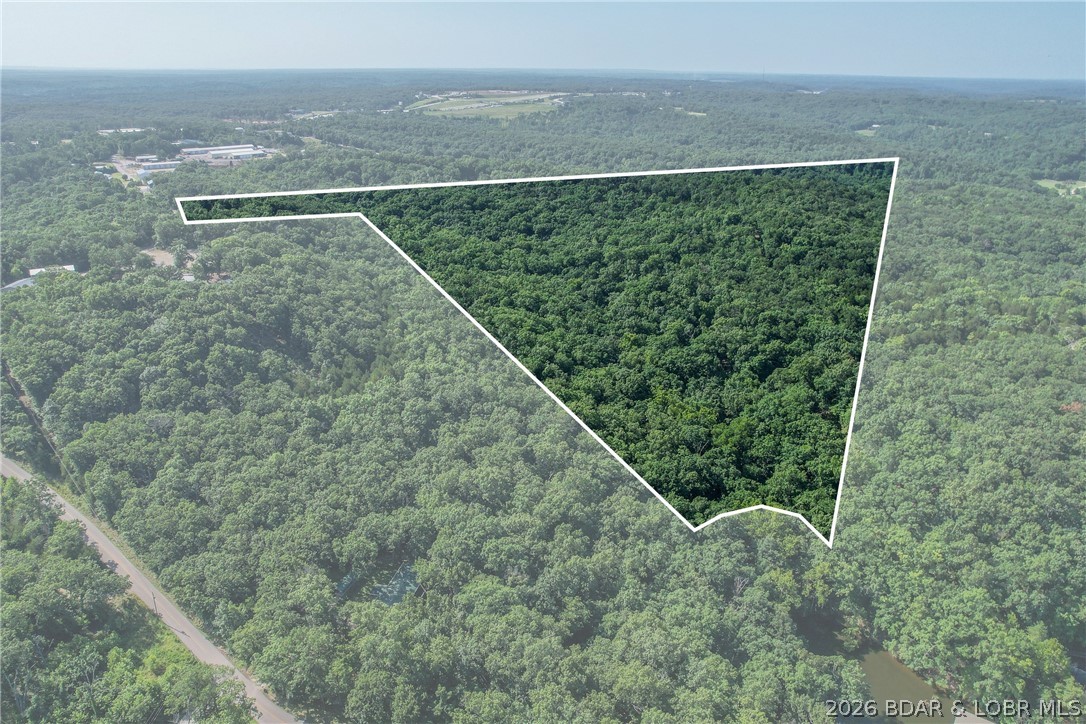 14 acres off Runabout Rd at the Lake of the Ozarks, just off Hwy 54. Space to build, space to breathe, and make it your own. Lake frontage you can enjoy, with access to the water. A solid piece of ground with potential for a private retreat, recreational enjoyment, or an investment for down the road, whether you're ready to start fresh now or hold for later. Nearby dining, shopping, entertainment, and medical facilities round out all that Lake of the Ozarks living has to offer.