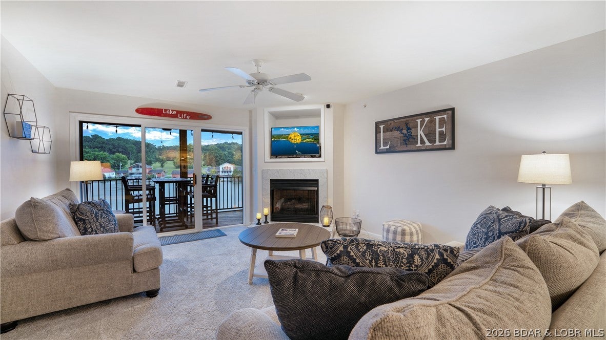 Lake living with no stairs into the condo, pool, or dock! This turnkey 2-bedroom, 2-bath condo was tastefully updated in 2021 with luxury vinyl plank flooring, new carpet, living room furniture, and a new water heater. Enjoy time on the water with an included 10x24 boat slip with hoist plus a PWC slip with lift. Cedar Glen offers two heated pools, playground, boat ramp, trailer parking, and plenty of green space. Conveniently located just off Highway 54, it’s close to town, Lake Valley Golf Club, and Old Kinderhook.