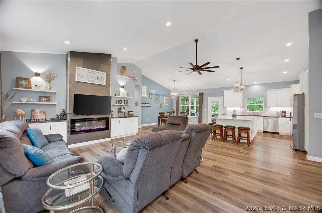Motivated Seller | $438,000 
Some homes just feel different when you walk through the front door, and this is one of them.
From the vaulted ceilings and oversized quartz island to the covered deck and seasonal lake views, pictures only tell part of the story.  You may be surprised by everything this home has to offer. Need extra storage?  Check out the insulated walk in crawl space.  There is an extra 80 by 200 lot included for privacy.  This home has it all in a beautiful neighborhood... and The Four Seasons amenities!  https://fourseasonspoa.com/amenities/  Come Take a Look!