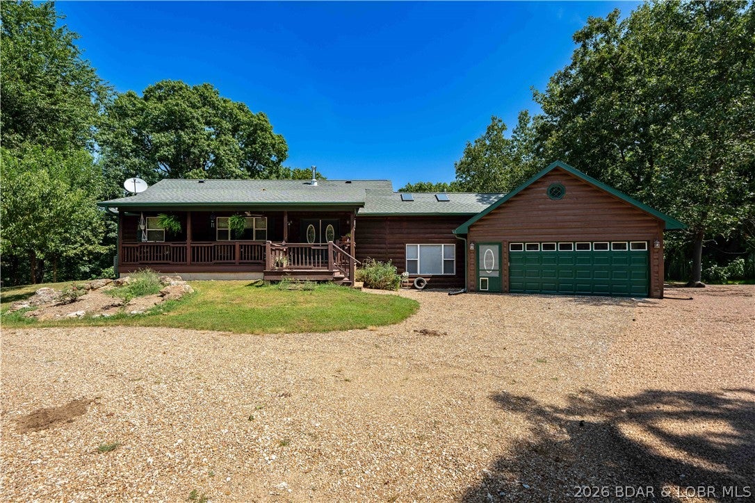 A Country estate like no other - 191 Master's Creek features everything you could ask for regarding an estate style piece in the middle of the Ozark Hills! Featuring an exquisitely finished custom home built in 2018: From the Granite countertops throughout, Oak and Walnut Ceilings with Walnut trim, custom woodworking accents, heated floors in the lower level, and a custom stone fireplace, the pride of craftsmanship throughout this home is instantly recognizable! Accompanied by 50+ acres and an outstanding 45x70 metal exterior building, this home is the perfect combination of modern design and old-world aesthetics. Overlook the valley from your in-ground pool or elevated back deck and watch your livestock roam over a 6-acre manicured pasture, which is watered by your .75-acre spring-fed pond. Also, enjoy over 2000 ft of access to year-round Rainey Creek, featuring swimming holes, babbling brooks, and shady creek banks. With a location located close to Edwards and Climax Springs, just a mile north of Hwy 7, and centrally between St. Louis and Kansas City, this countryside paradise is one not often found! Reach out quickly before you regret not exploring this central Missouri Gem!
