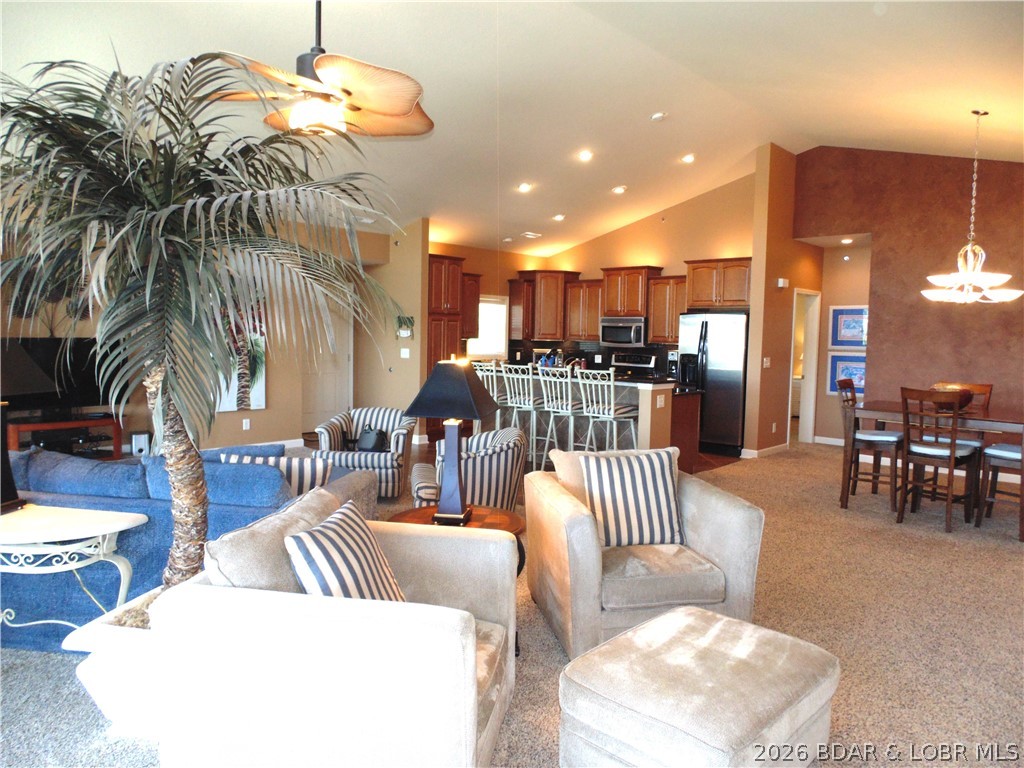 LUXURY SUMMER PLACE CONDO at Lake of the Ozarks – TURNKEY! This stunning top-floor condo that sits next to the timber offers 3 bedrooms, 3.5 baths, and is packed with luxury upgrades throughout. You’ll be wowed by the vaulted ceilings and exceptional attention to detail. This condo has a fabulous open floor plan that perfectly combines comfort and style.The spacious living area opens up to a large screened deck offering an amazing view of the lake. The kitchen features custom cabinets with granite counter tops. The lakefront primary bedroom has all the options and the other 2 bedrooms offers en suites that are spacious and provide peaceful, private retreats. The screened deck is perfect for entertaining. This condo comes furnished and includes a 12 x 32 boat slip w/hoist, 2 PWC Slips w/hoist providing all the amenities you need for lakeside living. Garage Available If Needed. Summer Place is an exceptionally well-maintained complex, located at the 35mm, and offers 2 pools, a clubhouse, and pickleball courts, making it a resort-style experience right at home. Don’t miss out on this incredible opportunity – schedule your showing today!