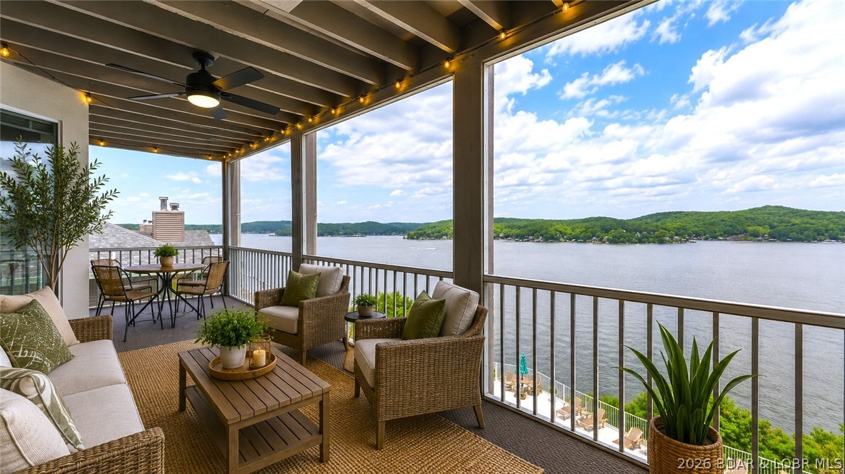NOW OFFERING ALL HOA assessments for 12 months, PAID by seller upon successful offer! VIEW is what sets this condo apart! Located at Windsor Bay Condos, this turn-key 3 BATH / 3 BATH end-unit offers breathtaking panoramic views of the Osage 34MM from its spacious screened-in & covered deck—perfect for enjoying the lake in any season. End-unit positioning provides additional side windows, filling the condo with natural light while maximizing the incredible lake views. All 3 beds feature private bathrooms & the larger-than-average kitchen offers abundant cabinet & counter space, rarely found in condo living. Includes a 10x30 boat slip WITH lift, PWC space (dock 3/slip 2L) & a private storage closet just outside the front door. The complex has recently undergone major improvements including a new roof, new siding, new railings & freshly sealed parking lot. Coming soon is a new pool liner & renovated pool deck scheduled for Fall 2026. Enjoy the lakeside clubhouse featuring a full kitchen, fitness equipment, games, fireplace & stunning lake views. The elevated pool deck offers some of the best views in the complex, while the docks are protected by a wavebreak for added peace of mind.