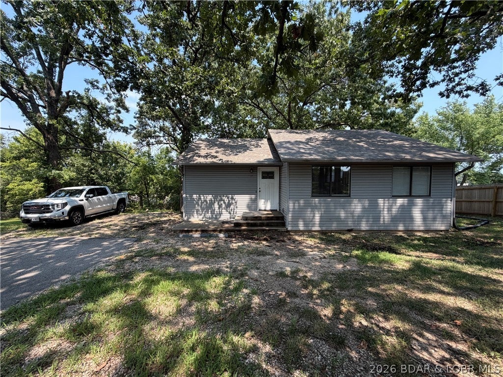 A solid opportunity in Osage Beach! This well-maintained, one-level home has served as a successful rental for the past eight years, with previous rental income of $1,300 per month. The home features three bedrooms, one full bathroom, and a private vanity in the primary bedroom for added convenience. The interior is ready for new flooring and fresh paint, offering the next owner an excellent opportunity to update the space to suit their style. Outside, the flat yard provides plenty of usable space, including room to build a future garage. Whether you’re looking for an investment property, a full-time residence, or an affordable home to personalize, 964 Murphy Road offers excellent potential in a convenient Osage Beach location.