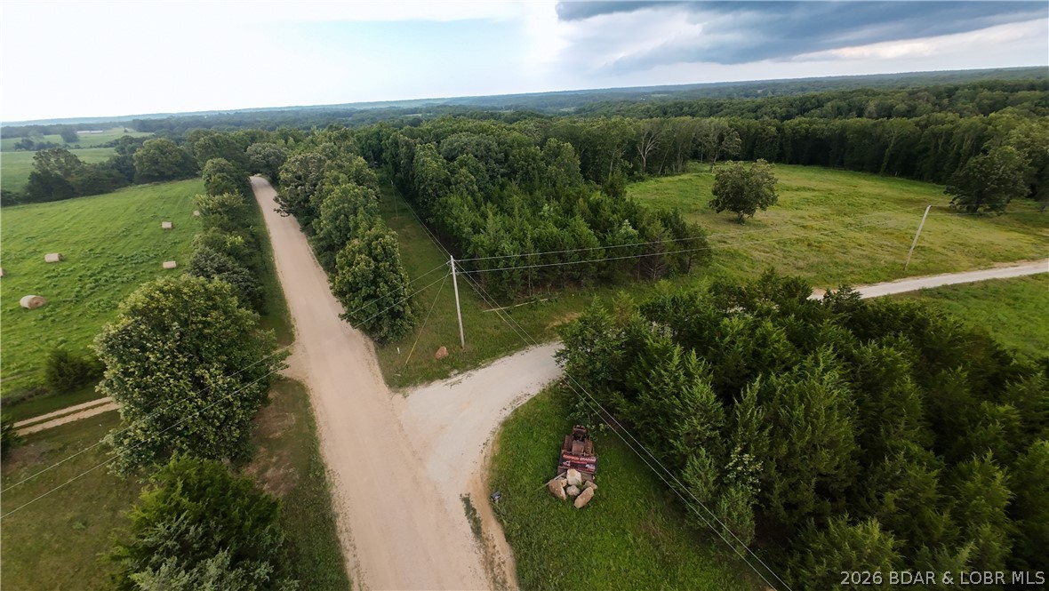 Ready to unleash your inner architect, hunter, or adventurer? This expansive 16.82 acre tract of gorgeous, undeveloped land is the ultimate blank canvas just waiting for your blueprints. Situated entirely outside city limits with absolutely no restrictions, this property offers complete freedom to build, hunt, or develop exactly as you see fit.
Whether you are dreaming of a secluded cabin tucked deep in the woods, a massive modern barndominium, or your own private hunting sanctuary, this acreage has you covered. Imagine waking up every day surrounded by mature trees, crisp country air, and total peace and quiet far away from the noise of city life.
There is abundant acreage to clear custom ATV trails, plant food plots, or establish a premier off grid adventure camp. Enjoy the deep woods privacy of rural country living while staying just minutes from central Eldon amenities and the booming Lake of the Ozarks market.
Property Highlight
Mid-sized acreage with zero restrictions is becoming a true rarity in Miller County. Grab your plans, pack your gear, and claim this slice of paradise before someone else builds your dream getaway!