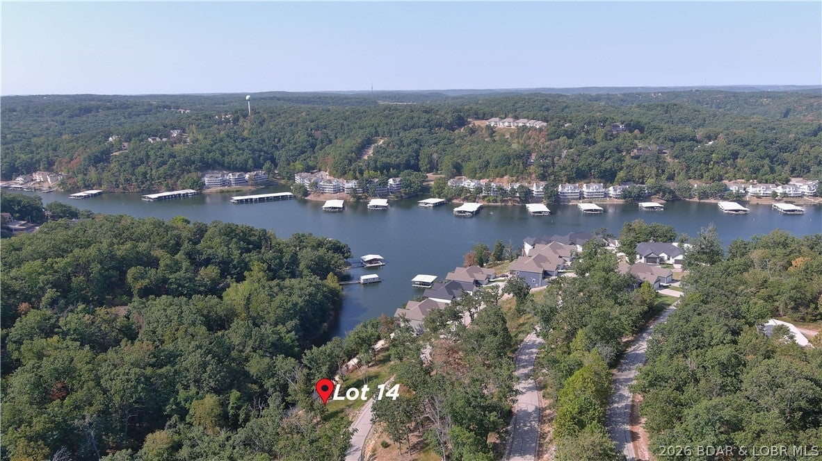 Amazing opportunity to purchase seasonal lake view lot in a well established subdivision. This lot will allow you to build a private home or a Villa in the Villas of Tuscany Subdivision. This location is one of the most ideal lots within the subdivision. Amenities are already in place with water & sewer, internet access through Spectrum. You will enjoy the amazing pickle ball court, community pool & bath house, and golf cart path down to the community docks. Note- proposed structure shall be approved by Architecture Review Committee and landscaping will also need to be approved. (Subdivision will maintain landscaping of home, just as a Villa). Buyer to verify hook-up fees to water & sewer. Great opportunity to build your dream home that allows for some maintenance free lake enjoyment or a Villa for yourself or for investment. Wonderful location by land and water.