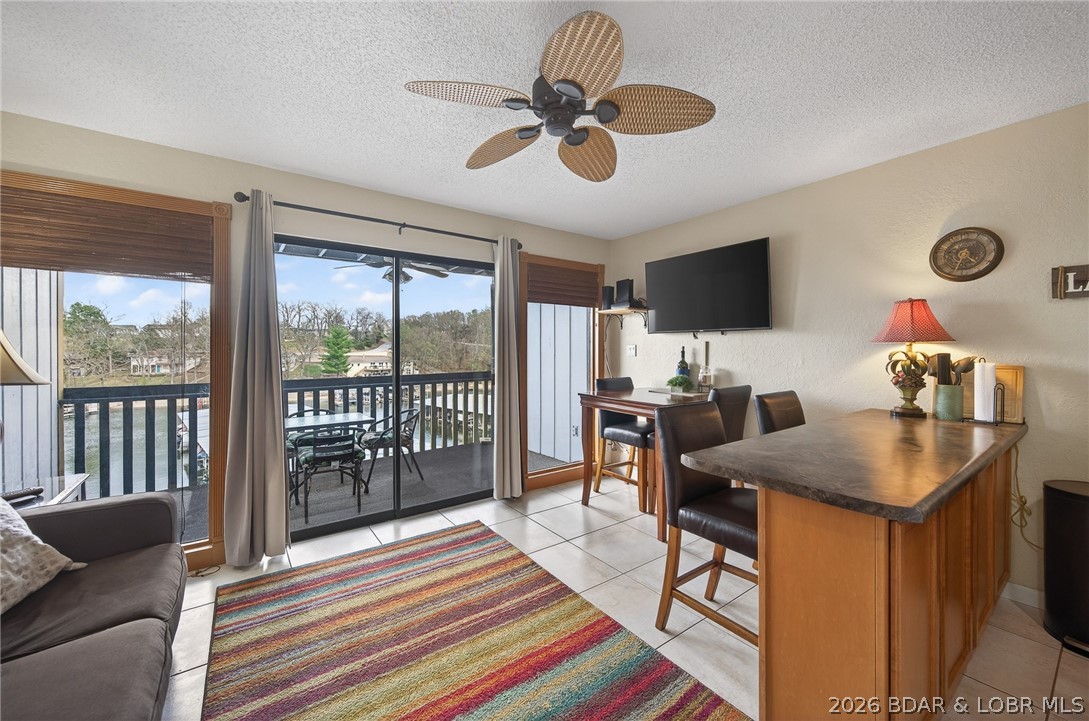 Updated, clean, and affordable! This turnkey condo on the 21 MM of Lake of the Ozarks is ready for summer enjoyment or immediate rental income. Being sold fully furnished, the next owner can step right in with no work needed.
The kitchen features ceiling-height cabinetry for extra storage, stainless steel appliances, and a full-size smooth-top stove. Enjoy the convenience of an in-unit stackable washer and dryer.
Take in great lake views from this well-positioned unit. Located just minutes from shopping, dining, and entertainment, this property offers both convenience and lifestyle.
Also included is a 10x24 boat slip on the community dock, adding both personal enjoyment and rental value.
Community amenities include a boat ramp, boat trailer parking, pool, tennis courts, and spacious common areas.
Perfect as a low-maintenance lake getaway or investment opportunity!