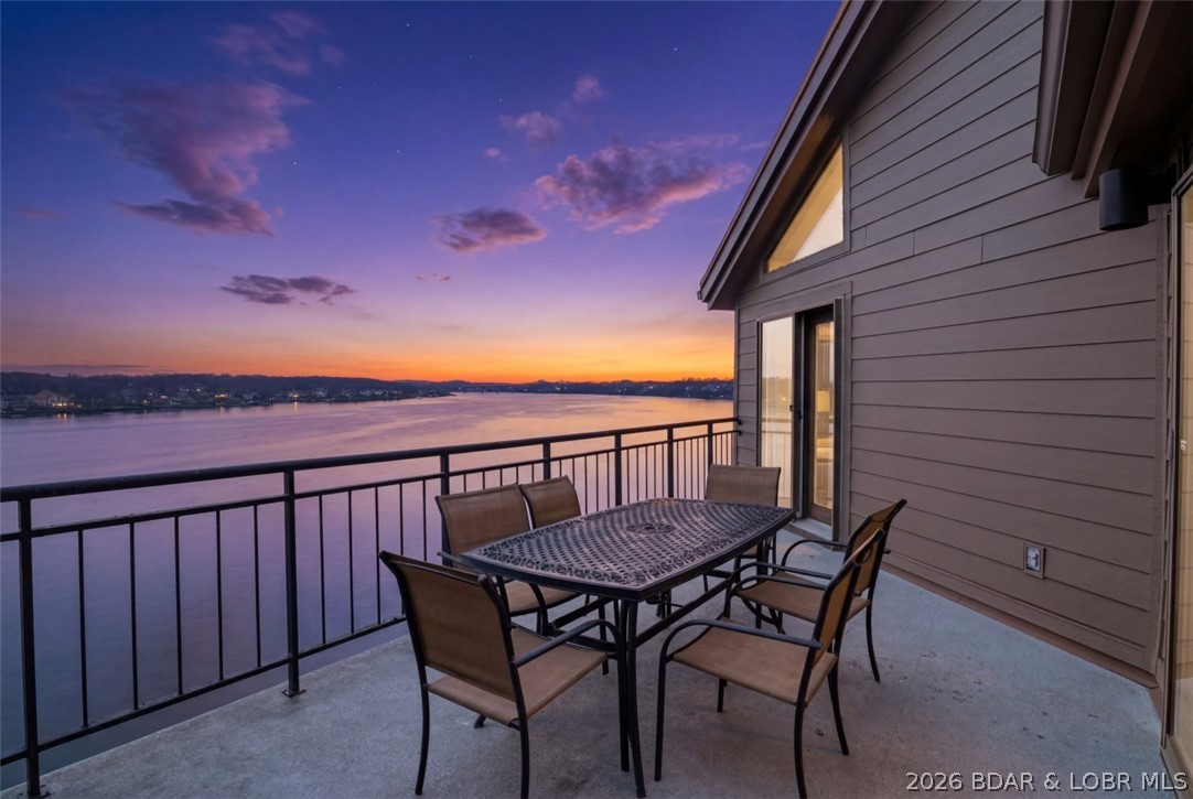 VIEWS!!! You get *TWO Private Balconies* over looking the Main Channel, you Won't find better views at the Lake on 17 Mile Marker. Watch the Fireworks or just Sunsets & Lots of Boat action all day long into the evening with your BBQ going and entertaining family and friends. This is a Turn Key unit, updated 3- Bedrooms, 3 Bathrooms, Updated Kitchen in 2026, and Bathrooms with Granite counter tops, plus new window treatments, New wine cooler, Laundry room is big for storage to use as well. All bedroom floors updated. No Carpet anywhere! Life is always Better at the Lake when you get the Whole view right from your Deck's.  Also a Large boat slip 14x32 and Boat lift are included in a protected cove off main channel.  All of the convenience in Osage Beach location! Need groceries or restaurants that are within a few minutes to the unit,,,,,  Offers are Welcome!!! Don't miss out on this Great unit!!