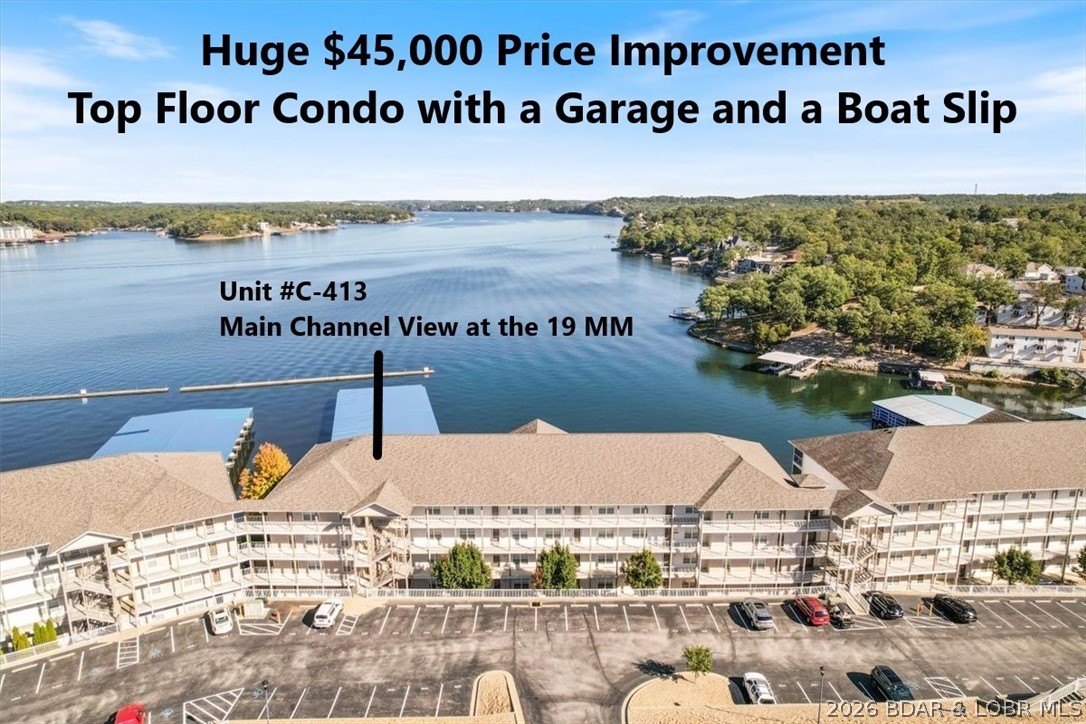 Huge Price Improvement - $45,000 Reduction - Top Floor with No-Step Entry includes the hard-to-find Garage, and a Boat Slip at Lands' End Exclusive Condos with that infamous 7-Mile View down the main channel at the 19 MM. It is a TOTAL PACKAGE! Location! Location! Location! It matters! Plus 9 ft. interior ceilings, 3 bedrooms and 2 full baths, and a huge waterfront deck. This 1,520 sq ft updated condo has a large breakfast bar & SS appliances, ceramic & LVP flooring. The primary suite has a granite double bowl vanity and a whirlpool tub, separate shower & a walk-in closet. Bedroom 2 has direct bathroom access. MFL with full size W/D. All you have is an electric bill. Everything else is included, propane for the gas fireplace, water, sewer, trash, cable TV, Internet, ext. maintenance, lawn care with sprinklers, snow removal, 3 pools, including the lazy river pool, splash pad pool and the main pool with zero entry, exercise facilities and clubhouse with pool table, playground and basketball. (This condo front door entry, the garage, and the boat slip are all handicap accessible with no steps via the elevators and wide golf cart path, as well as the main complex pool with zero entry.)