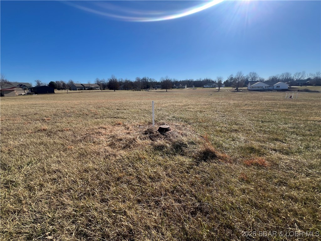 Prime development opportunity! This 10.17-acre tract offers city water and city sewer already on site, saving time and development costs. The property is ideally suited for residential development, with ample acreage to accommodate multiple home sites in Wilhelm Estates. Convenient location with easy access while still offering space to design and build. A rare find with utilities in place—ready for your vision to move forward.