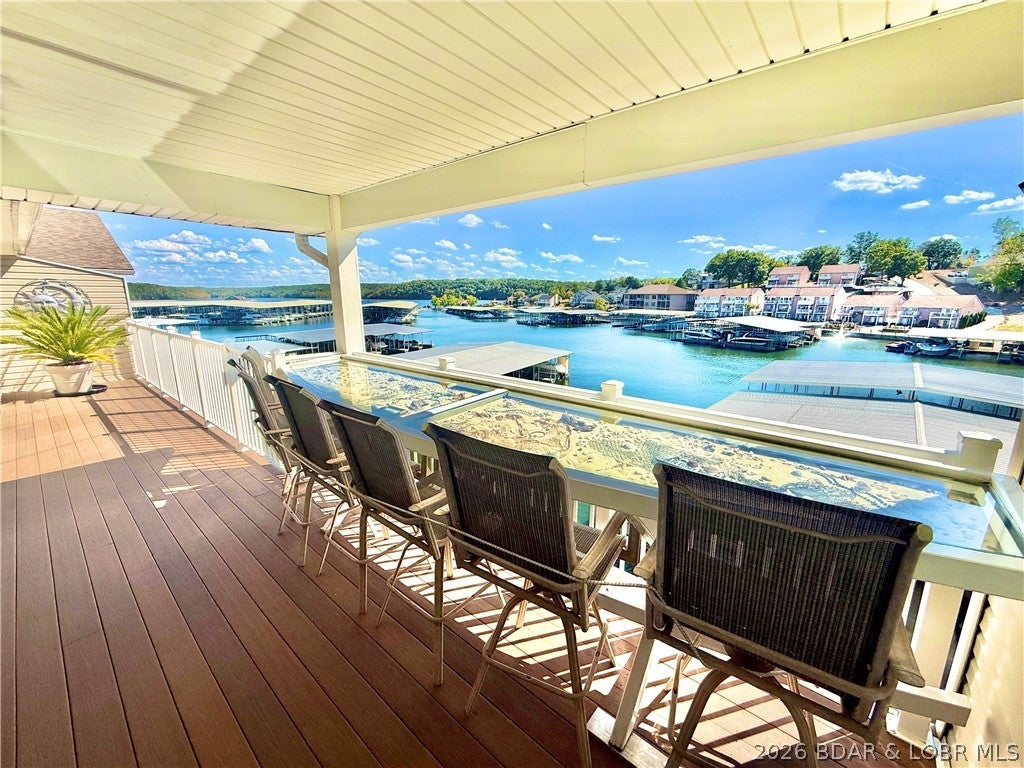 Experience the best of Lake living at this beautiful LAKEFRONT condo with a HUGE 16X44 SLIP, perfectly positioned for both exciting weekends on the water and peaceful days surrounded by nature! 

Head north by boat on a summer Saturday and enjoy a fun outing at DOG DAYS, REDHEADS, and SHORTY PANTS. 

When Sunday calls for something a little more relaxing, cruise south to the LAKE STATE PARK and spend the day hiking scenic trails, fishing, or exploring. 

Back at home, unwind on the SPACIOUS COVERED PATIO while taking in gorgeous views of the lake. Step inside and the views continue, with the water visible via sliding glass doors from the living room, primary bedroom, and 1 of the 2 guest bedrooms! 

The OPEN CONCEPT LAYOUT creates a bright, inviting atmosphere that’s perfect for entertaining friends and family, while the breakfast bar provides the ideal spot for morning coffee, or gathering together after another unforgettable day at the lake. 

During winter, cozy up next to the fireplace and watch snow fall onto the lake. This condo has the best of all worlds, no matter your lifestyle preferences, or changing seasons. Come see for yourself!