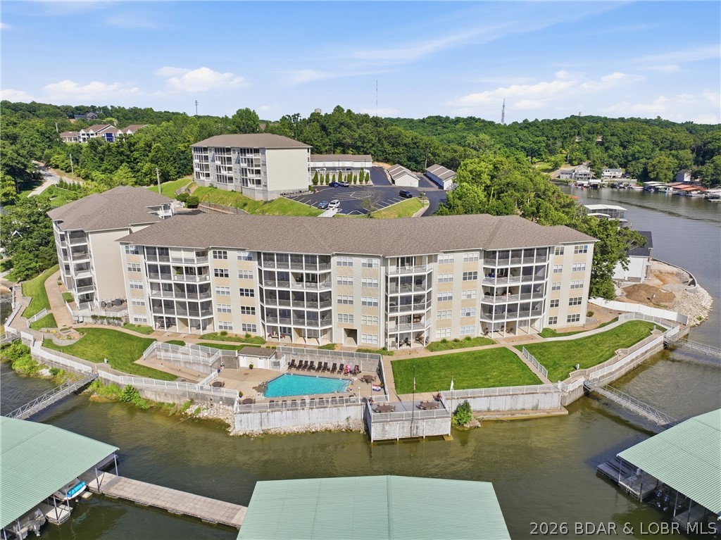 135 Cape Royale is a beautifully furnished 3-bedroom, 2 bath-lake front condo with stunning views of Lake of the Ozarks at the 17-mile marker of the Osage Arm.  This tastefully decorated unit includes a 14" X 40" Boat Slip with hoist, access to the community pool, and is located in the gated Cape Royale community in the heart of Osage Beach.  Enjoy the convenience of the nearby lakefront dining, grocery stores, and Walmart- all just minutes away!