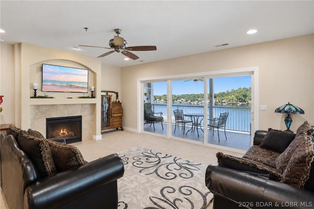 IMMACULATE & CHERISHED condo available for sale!  This community rarely offers resale condos - the residents love it for a reason!  Located in a quiet and deep cove, this association feels like home and offers an unusually large layouts for families and full time owners!  Located at the 5MM in the Lick Branch Cove and part of the Timberlake subdivision, you won't find better maintained roads and beautifully landscaped paths in all of the lake!  There is an XL covered porch - part of it is screened a+ covered and part of it is open.  This is a very large floorpan for a condo of any sort.  Forest Pointe amenities include a community pool, clubhouse and playground making it ideal for unforgettable weekends and unwinding!  There is a 12x40 boat slip as well as two PWC slips - all with lifts.  Come check this one out!
