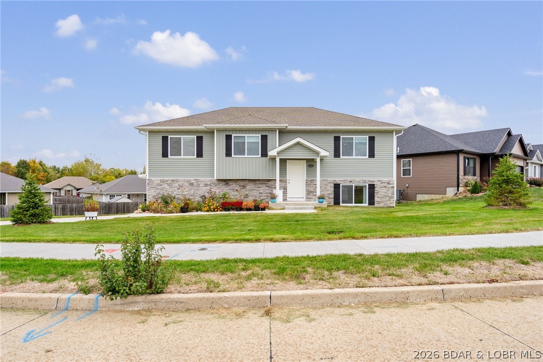 Welcome to your NEW Move-In Ready Home! This stunning 3-bedroom, 3-bath residence offers 1,638 sq ft of thoughtfully designed living space in the desirable Tuscany Ridge Subdivision in Columbia, MO. Perfectly positioned against the scenic 50-acre Smith Park, enjoy peaceful views, walking trails, and direct access to nature close by. The bright open floor plan seamlessly connects the living, dining, and kitchen areas—ideal for both entertaining and everyday living. The kitchen includes all stainless-steel appliances, refrigerator, range, microwave, and dishwasher. Sellers have added numerous upgrades, including custom blinds, built-ins, deck awning, bluegrass sod, re-carpeted stairs, professionally finished lower level with a family room and full bath, and professional landscaping. The gentle corner lot provides a spacious backyard perfect for play or relaxation, plus a 2-car garage for convenience. Located just minutes from Hwy 70 and Hwy 63, this home offers the perfect blend of comfort, style, and accessibility. Don't miss this incredible opportunity! ***Seller offering a $2500 buyer incentive at close for repairs, buy down pts etc.