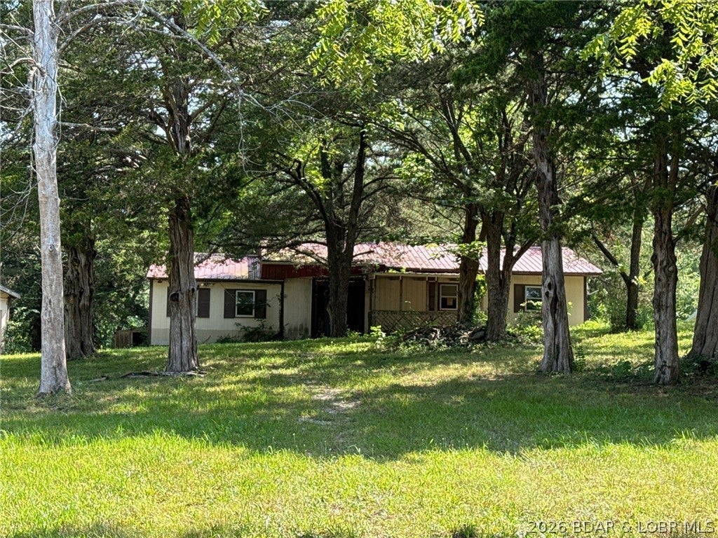 Own this 3-bedroom, 1-bathroom ranch-style home nestled on a spacious 0.96-acre lot. With approximately 1,248 square
feet of comfortable living area, this property features an attached 1-car garage which provides an opportunity for
additional space for storage and other purposes. Located in Warsaw, the lot gives closer to nature scenery.