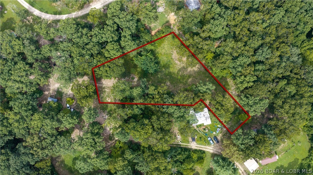 Beautiful opportunity to own two parcels totaling approximately 0.62 acres, offering seasonal lake views and a convenient location just minutes from the Lake. Enjoy the peaceful setting while being close to the lake, boating, fishing. A great location for a future homesite or getaway at the lake!