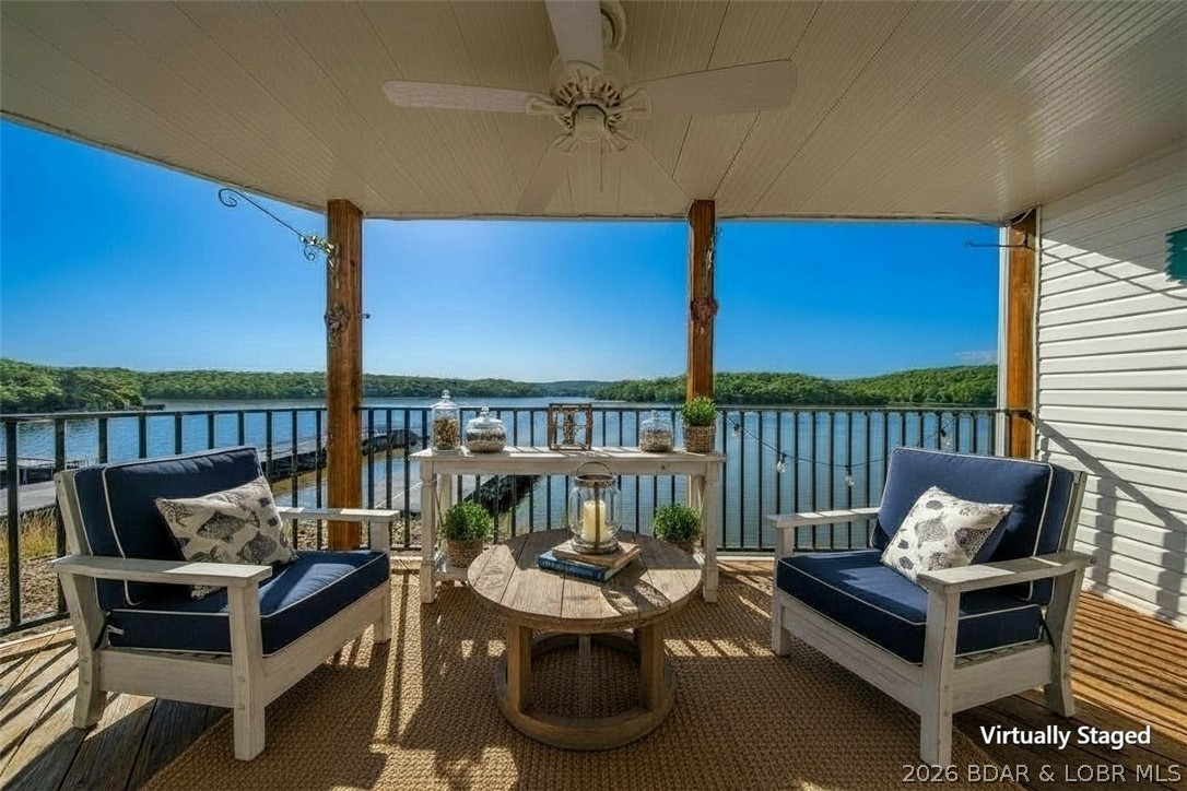 This is the perfect place to make your own.  Located on the quieter Grand Glaize Arm of the Lake of the Ozarks, this 2 br 2 bath condo is just waiting for your special touches.  Soak in the panoramic view of the state park.  NEW flooring/carpet, paint, hotwater heater, dishwasher, granite kitchen counters, sink/faucet.  NEW washer/dryer combo saves space allowing for more storage area.  12x30 boat slip is included.  This complex abounds with green space and is pet friendly.  A community pool with covered areas & ample room for sunning, playground, trailer parking, clubhouse with workout room and kitchen are all complex amenities. Located within the state park where there are trails to hike & bike, a beach & boat launch is where you'll find your new lake escape.  Crappie, bass & catfish are caught right off of the docks.  This is the perfect area for boating, wakeboarding or just coving out as it is surrounded by gorgeous state park views.  Only 10 miles back to Osage Beach Pkwy where restaurants and stores are found.  By water, you are an easy boat ride to Dog Days, Backwater Jacks, Shorty Pants & Redhead Yacht Club.  Stop the search, here it is-Dreams to Reality!  Call today!