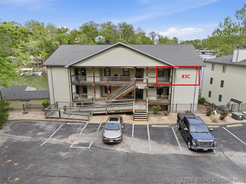Experience the best of lake living at 158 Willow Ridge Point in Lake of the Ozarks! This top-level, waterfront condo offers stunning channel views from a north-facing covered balcony—perfect for enjoying peaceful mornings and shaded afternoons.

Inside, you’ll find a spacious 2-bedroom, 2-bath layout with vaulted ceilings that enhance the open, airy feel. This unit is ideal for both relaxing and entertaining.

Boating enthusiasts will love the newest 14x32 end boat slip, offering direct access to the swimming dock, plus three PWC (waverunner) slips—a rare and valuable combination. Located at Mile Marker 1, you’re in a prime spot for convenience and quick access to everything the lake has to offer.

Additional features include two exterior storage closets for all your water toys, a designated parking spot directly across from the condo, and access to a community pool.

This is lake life made easy—don’t miss your chance to own a slice of it!