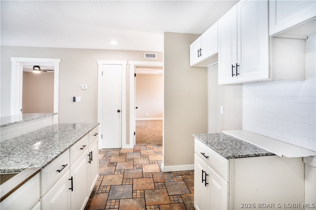 Affordable lake living is getting harder to find, making this fully updated 2-bedroom, 2-bath walk-in condo an opportunity you won't want to miss! Priced under $200,000, this move-in-ready unit offers breathtaking main channel views of the Glaize Arm and a front-row seat to all the boating action. The convenient walk-in location, just steps from the elevator, provides easy access for owners and guests alike. Inside, you'll find tasteful updates throughout with a bright, inviting interior ready for your personal furnishings. While this unit does not include a boat slip, Bridgeview Marina is located right next door with potential slip rentals available. This investor-friendly complex features a beautiful lakeside pool and spacious sundeck positioned right on the water. Located in the heart of Osage Beach, you're minutes from the new Oasis, Dog Days, Backwater Jack's, shopping, dining, entertainment, and Lake of the Ozarks State Park, offering some of the area's best fishing, boating, and wakeboarding. Updated, affordable, and in a prime location, this is the value buyers have been waiting for!