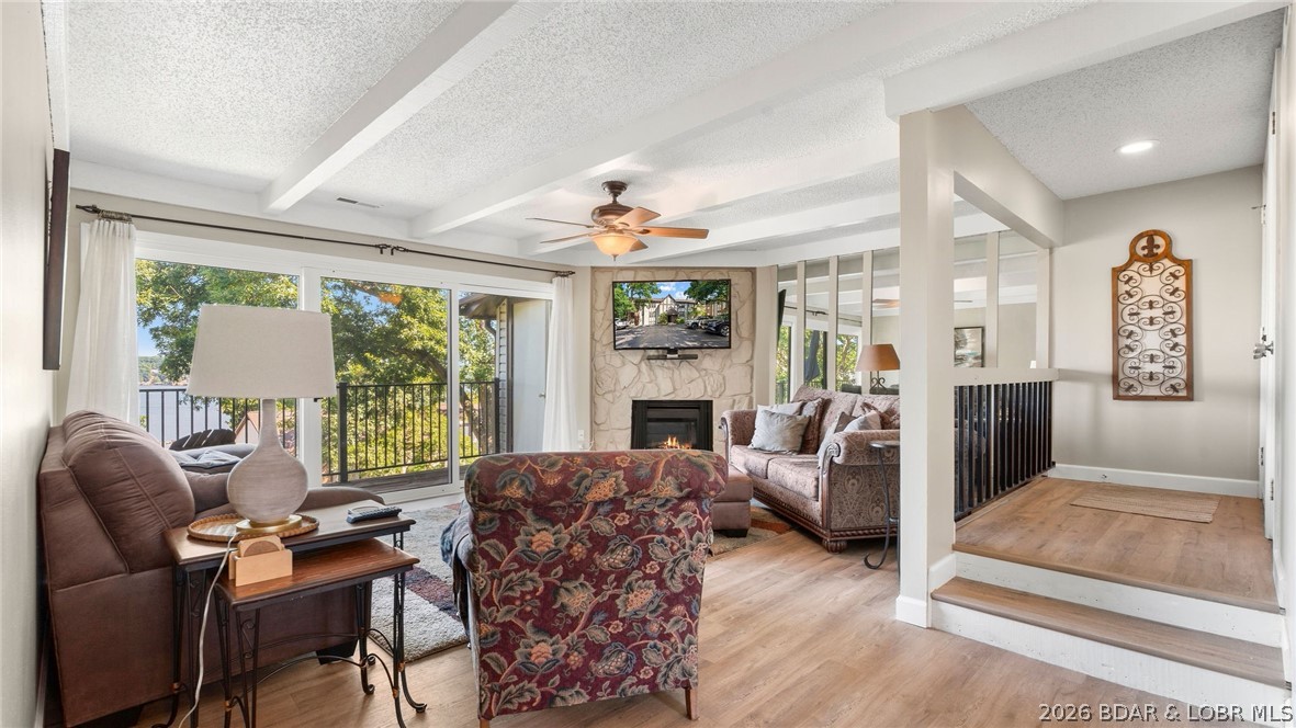 Experience the best of Lake of the Ozarks in this spacious, top-floor condo at Waters Edge. Featuring breathtaking main-channel views from every room, this 2-bedroom, 2-bath retreat comes fully furnished and move-in ready. Recent updates include fresh paint, new flooring, updated kitchen cabinets, and a full-size washer and dryer.  Perfect for boaters, the unit includes a 10' x 24' boat slip and a 4,000 lb. lift. The Waters Edge community offers an unmatched lifestyle with a lakefront walking and golf cart path, swimming pool, playground, gym, and courts for tennis and pickleball. Located in a golf cart-friendly area, you’re just minutes from The Cove and The Ridge golf courses and a short boat ride from popular dining spots like Lake House 13, Franky & Louie’s, and Backwater Jacks! If you’re searching for an affordable lake getaway with premium amenities and a boat slip, this condo is a must-see!