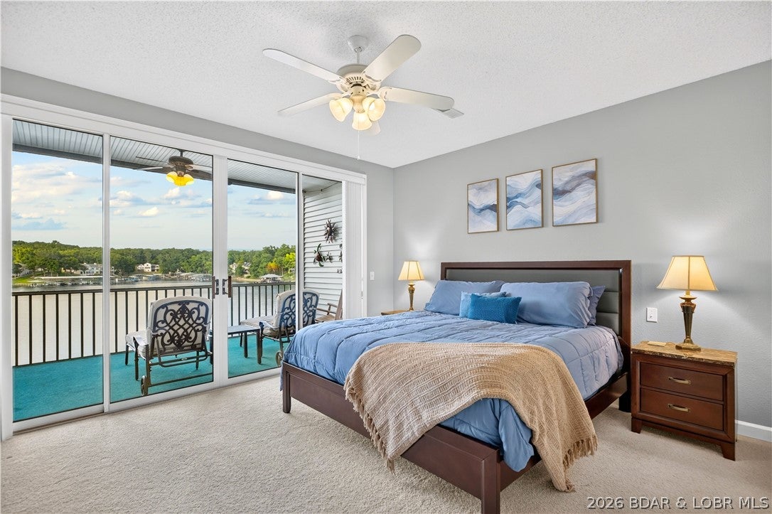 Do you ever wish life could be easy? Well, it can be. This walk-in, zero step condo is designed for exactly that - pull in, park, walk right in, & start enjoying the lake. That’s effortless lake living! Located at the 18MM with beautiful lakefront views, this spacious 3BR/3BA end-unit gives you the privacy, convenience & amenities to simply enjoy. Updated furnishings & tasteful décor, wide, open living spaces, and a private bathroom for every bedroom make this condo truly turnkey. Updates include refreshed showers and flooring, new HVAC (July 2026), plus a new water heater and softener (2024). The oversized deck extends your living space and brings the lake right to you—perfect for morning coffee, sunset cocktails or gathering with friends and family. A 12x40 boat slip with two ship-to-shore power outlets is included. Want to make it even easier? An optional garage directly across from the unit is available, along with two side by side PWC slips with lifts & a dock box. Last but not least there is grassy area just outside the unit perfect for furry family members. Arrive. Unwind. Get on the water. Repeat. Lake life really doesn’t get much easier than this.