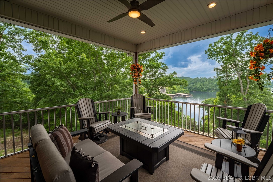 Prepare to be impressed by this stunning custom-built Thomas Construction home, where luxury craftsmanship and thoughtful design come together in one of Cross Creek's most desirable gated communities. Every detail showcases top-of-the-line finishes including heated bathroom floors, Andersen 400 Series windows, custom window treatments, and a striking floor-to-ceiling stone gas fireplace. The open-concept design captures incredible lake views and flows effortlessly to expansive Trex decking with both covered and screened outdoor living spaces. The spacious lower level features a John Deere room w/concrete golf cart path access, perfect for a side-by-side, golf cart, mower, and lake toys, plus an oversized 3-car garage. Includes a 12x32 boat slip in the community dock, offering all the benefits of lake living w/out private dock maintenance. An additional subdivided vacant lot next door is included, providing endless possibilities for future expansion, a private pool oasis, or the opportunity to sell it separately. Located in the gated golf cart-friendly Cross Creek community w/ a clubhouse, pool, and playground, this impeccably maintained, magazine-worthy home is truly one of a kind.