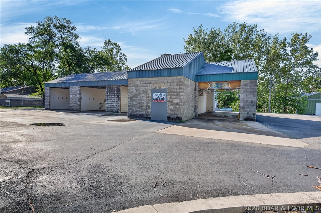 Excellent opportunity to own a well-established, income-producing car wash located directly on high-visibility State Hwy 7 in Greenview. This 4-bay facility offers three self-service bays and one automatic bay, providing multiple revenue streams to serve a wide range of customers. The property also includes two vacuum stations, adding additional convenience and income potential.
Proudly owned and maintained by the same seller for nearly 30 years, this business reflects long-term stability and a loyal customer base. The structure is constructed of durable concrete block with a metal roof, offering low-maintenance ownership and long-lasting durability. Positioned in a prime location with steady traffic flow, this property presents a strong investment opportunity for an owner-operator or investor looking to expand their portfolio. Turnkey and ready for continued operation, this is a rare chance to acquire a proven business in a high-demand area. Also included is a pit cleaner.