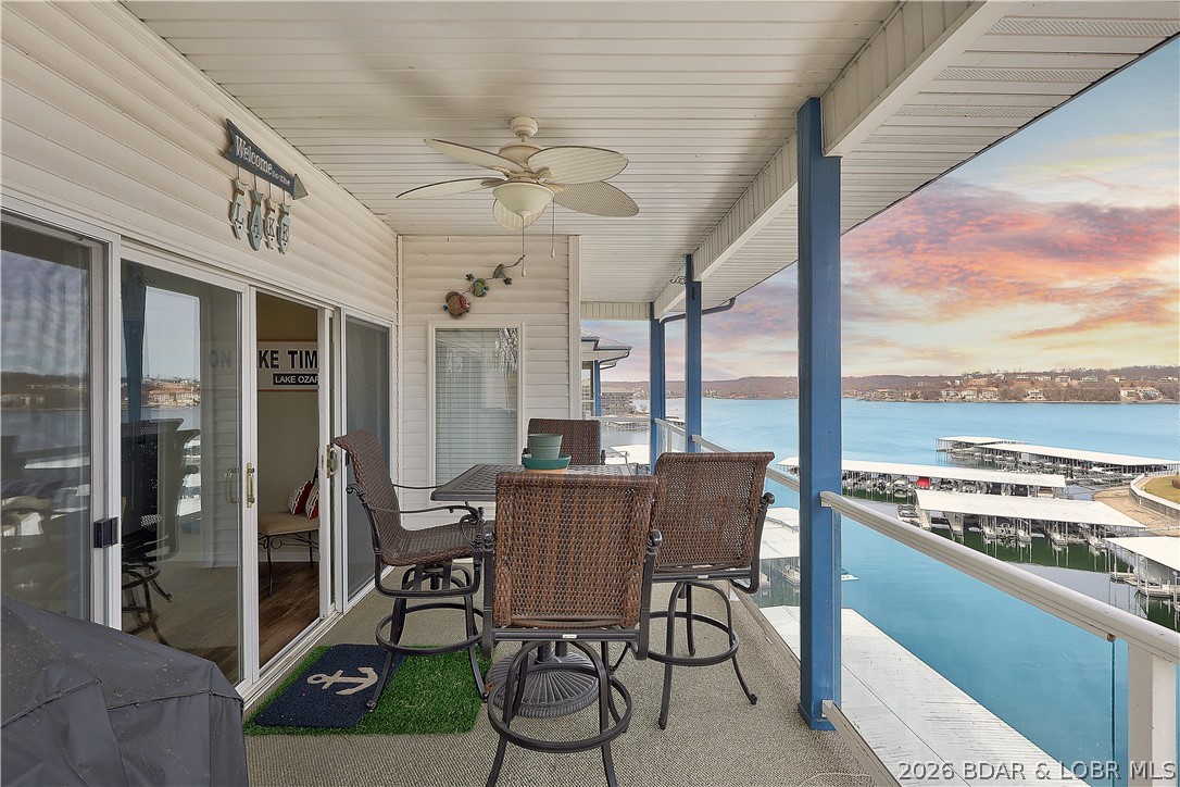 Welcome to Monarch Cove, where this fully furnished, top-floor end unit delivers comfort, views, and turnkey convenience. Offering three bedrooms and two bathrooms, the condo captures beautiful lake views and abundant natural light throughout. The open-concept living space flows into a modern kitchen, creating an ideal setting for entertaining or relaxing after a day on the water. Step out onto the private balcony to enjoy the lake atmosphere.

The primary suite features an updated en-suite bath with a refined feel. Two generously sized guest bedrooms are complemented by a recently updated full bathroom, making the layout both practical and inviting.

This unit includes a 12x36 boat slip with immediate access to the lake at the 2mm, Owners enjoy access to three community pools, private parking, and elevator access.

Ideal as an investment property, vacation retreat, or full-time lake residence, this condo is conveniently located near shopping, dining, and popular lake attractions for easy entertaining.