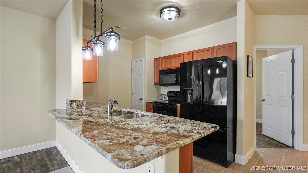Best priced unit in Isla just added a furnishings allowance!!  Trade the ordinary for island living, where you’re surrounded by water, fueled by sunshine, and your toughest decision is pool day, lake day, or both. Welcome to Isla Del Sol, where every day feels like a vacation. Spend your mornings sipping coffee on your screened east-facing deck, and afternoons at the pool or on the water. After a full day of lake fun, come back to a space that’s comfortable, updated, and ready to gather, featuring granite countertops, durable waterproof LVP flooring, and a layout that makes it easy to relax and recharge. Everything here is designed to make lake life effortless, from designated parking and elevator access to the quick walk to the lakeside pool and docks. Your oversized 14x36 boat slip is positioned in the calmer waters of the cove side. You can even keep an eye on your boat right from the unit. Offered as the lowest priced condo in the entire complex, this is an incredible opportunity to own a slice of unique island living. Whether it becomes your weekend escape, your full-time retreat, or an investment that works for you, lake days will turn into lasting memories.