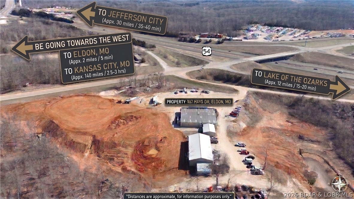 OVER 450 FT OF HWY 54 VISABILITY!!! OVER 400 FT OF HWY 52 & BUS 54 FRONTAGE. Position your business
where opportunity meets visibility at 167 Hays Drive, offering nearly 10 acres in a prime location just off
Business 54 and Highway 54. This property features a 90x100, red iron, clear span main building heated and
cooled, with a 30x40 attached heated and cooled 2 bay shop. The main 90x100 building is complete with four
offices, two bathrooms, 3 phase power, and three garage doors for easy access. A 50x100 spray foam insulated
shop adds even more versatility with three additional garage doors and the option for three car lifts. The
acreage will be leveled, creating room for expansion, storage, or future development, and a billboard provides
added exposure. High visibility, easy access, and endless potential make this an exceptional commercial
opportunity. Broker Owned