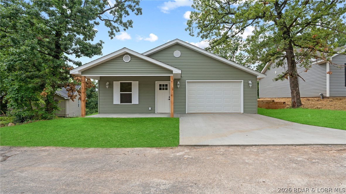 NEW QUALITY BUILD! Modern living in this new three-bedroom, two-bath home nestled on a cul-de-sac in the desirable Oak Hill Forest Subdivision and School of the Osage school district. The bright, open-concept layout creates a seamless flow for everyday living and entertaining, featuring a spacious kitchen with stainless steel appliances. Enjoy the convenience of angarage and a relaxing back deck, all on a single level. Perfectly located between Eldon and Lake Ozark, this home provides quick access to the Bagnell Dam Strip, where you’ll find excellent shopping, dining, and lakeside entertainment. This thoughtfully designed new construction blends peaceful country surroundings with the excitement of lake adventures, delivering the best of both worlds in a quiet setting.