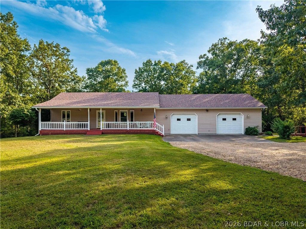 Beautiful VERY WELL maintained country home on 19 manicured acres with many trails throughout.  Very private setting but just 1/4 mile to hwy 135 and 3 miles to town and a Winery is down the road.   Enjoy the covered back deck or sit in your hot tub and enjoy watching all of the wildlife drinking out of the stocked pond.  This home has a open floor plan with custom cabinets and newer Luxury Flooring, Corian counter tops, Thermal pane windows .  The up stairs has a fresh coat of paint within the last month.  The basement offers a large open space with bar area, pool table, full bathroom and plenty of space for bedrooms or just extra sleeping, plus newer wood stove that is insurance approved.  Lots of wood that is already cut and in the 24 x 30 shed.  Wonderful oversized 28 x 40 attached garage that has heat in it, house and garage has 2x6 exterior walls. 8 x 16 tool shed for all the extra stuff.  If you are looking for a MOVE IN READY with a manicured 19 acres then you will not find a better place to CALL HOME.