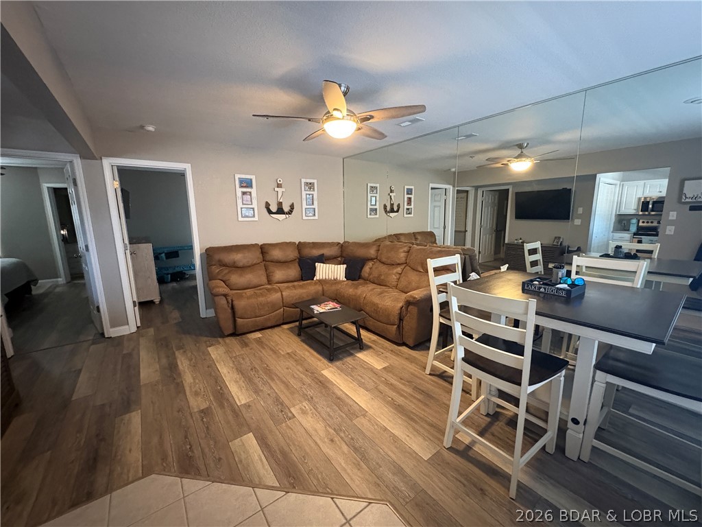 Enjoy all the perks of lakefront living, including easy water access, nearby dining and entertainment, and low-maintenance living so you can spend more time enjoying the lifestyle you deserve! This beautiful 2-bedroom 2-bath WALK-IN condo is perfect for that getaway! This beautifully maintained unit offers a perfect blend of comfort, convenience and lake life living. Step inside to a spacious living area or enjoy your private deck overlooking the channel. Whether you are looking for a full-time residence, weekend getaway with family and friends, or investment opportunity-this condo checks all the boxes! By land or water you are situated in a prime location for all the fun, great food and beautiful scenery the Lake of the Ozarks has to offer!