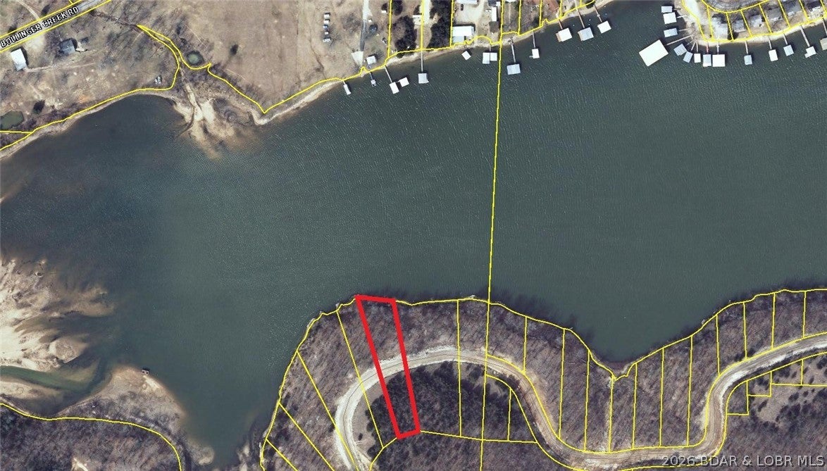 LAKE OF THE OZARKS - Enjoy stunning views from this exceptional 111 feet of lake frontage in beautiful Bollinger Creek Cove. This prime waterfront property offers central sewer and community water, making it ready for your dream home.

Perfectly situated at the 44-mile marker, this lot provides both breathtaking scenery and convenient access by land or water. Don’t miss this opportunity to build your ideal lakeside retreat—schedule your showing today!