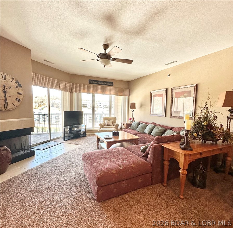 SHORT-TERM RENTALS ALLOWED! Whether you're looking for an income-producing investment, weekend getaway, or full-time lake home, this turnkey condo offers the flexibility buyers want.

This fully furnished TOP FLOOR, END UNIT condo features 3 bedrooms, 2 baths, an open living area with fireplace, and a spacious deck perfect for relaxing or entertaining. Located in the highly desirable Horseshoe Bend area at the 12 MM, you'll be just minutes from popular waterfront restaurants, bars, golf courses, and attractions.

A 12x30 boat slip with a 10,000 lb lift is included, along with access to the community pool and well-maintained grounds. Most furnishings stay, making this a true move-in or rental-ready opportunity.